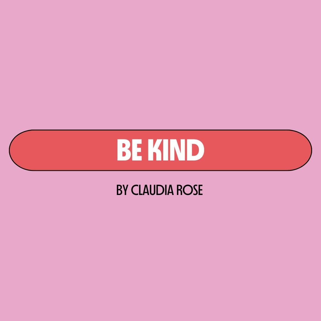 Pink background with a red text box containing white writing that reads: "be kind." Underneath is black writing that reads: "by Claudia Rose."