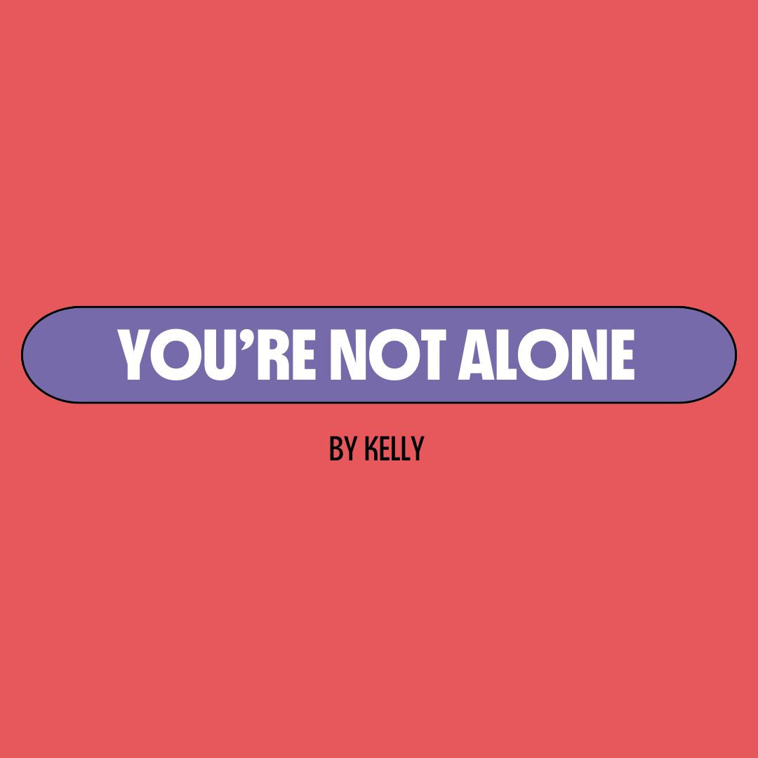 Red background with a purple text box containing white writing that reads: "you're not alone." Underneath is black writing that reads: "by Kelly."